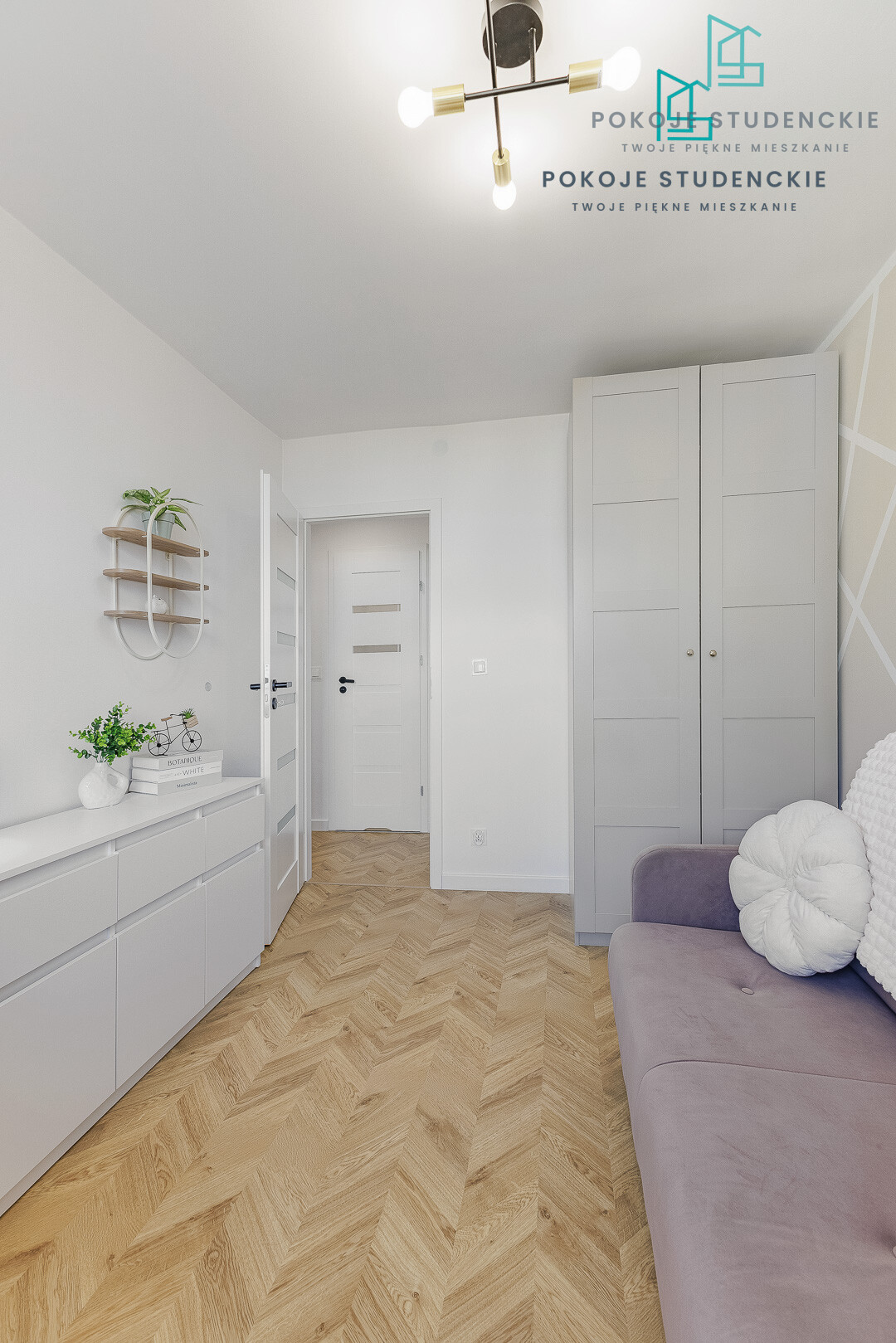 Minimalist white living area with light wood herringbone floor, white cabinets, a tall gray wardrobe, and a lavender sofa with cushions.